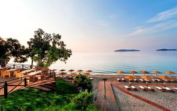 'Vasilias beach in Skiathos, bathed in hues of blue, pink, and orange' - Σκιαθος